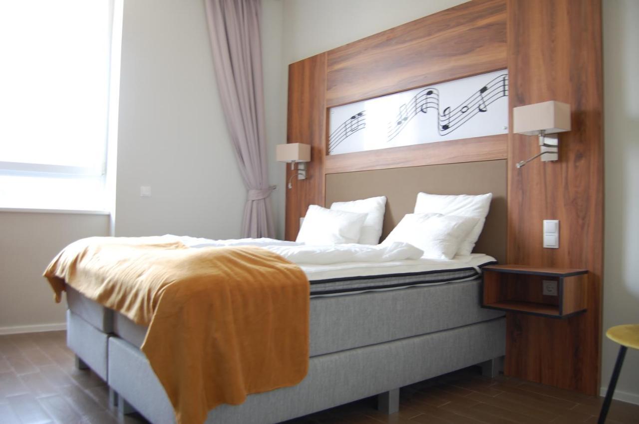 Apollo Hotel Wina Bagian luar foto