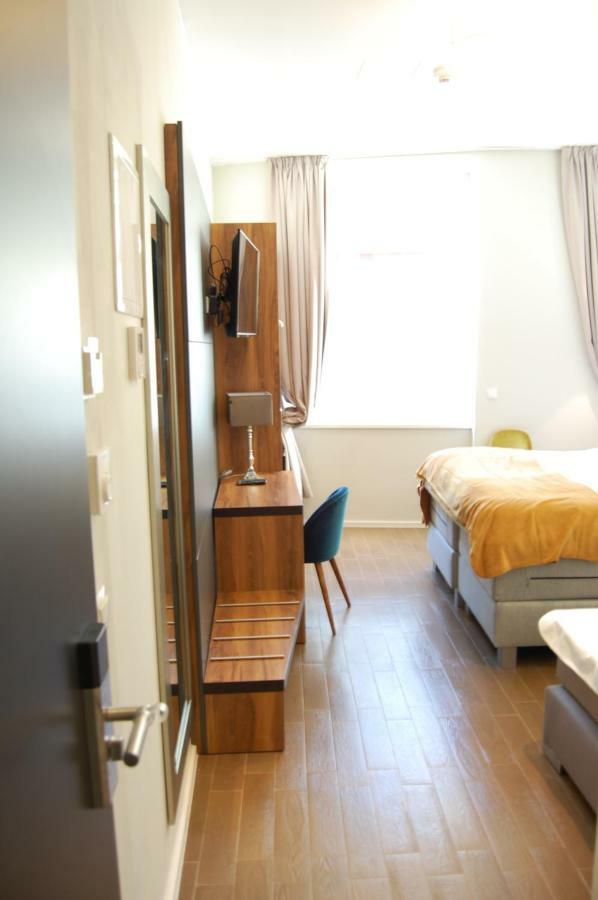 Apollo Hotel Wina Bagian luar foto